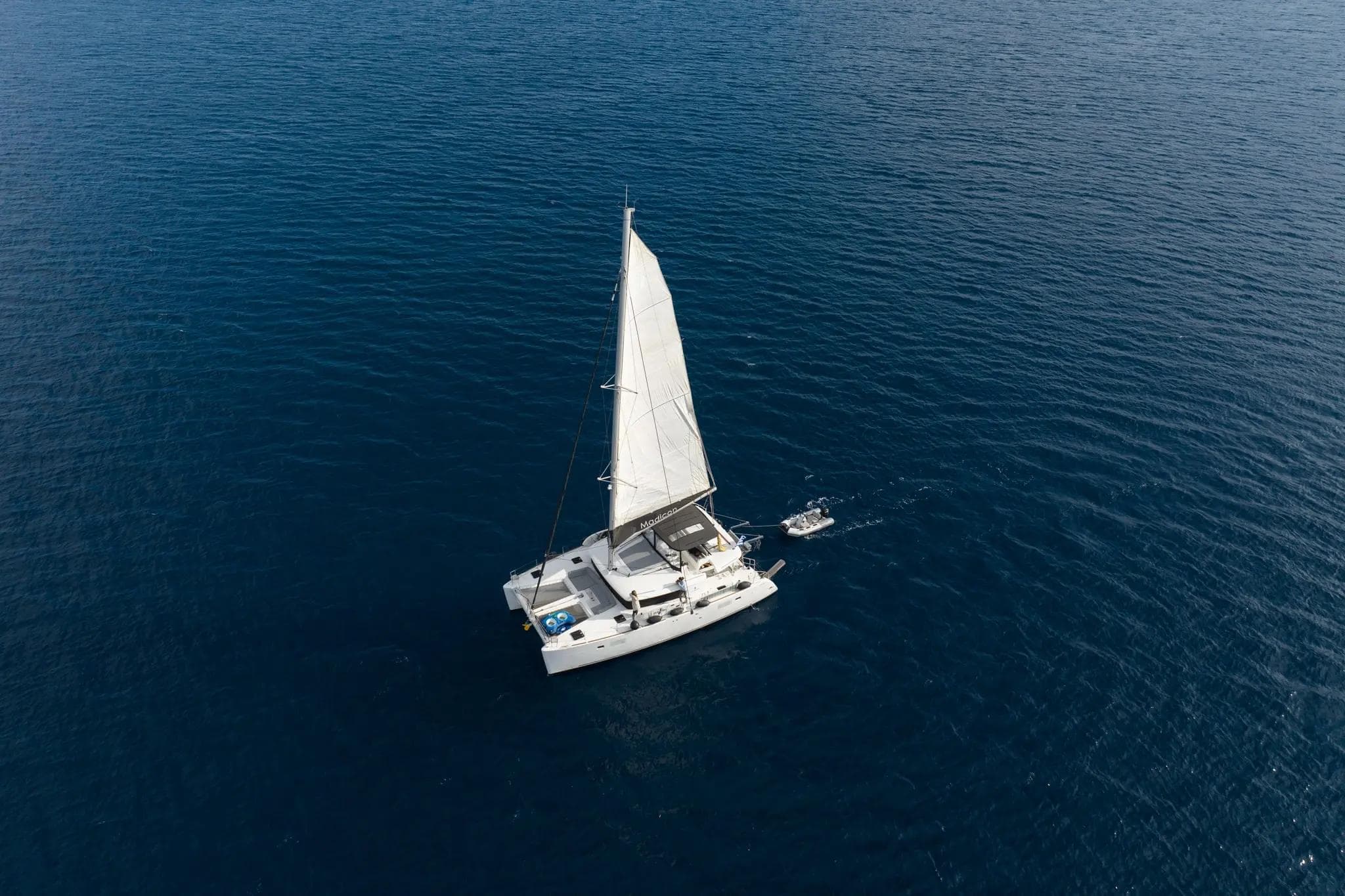 14-metre Lagoon 450 Fly sailing catamaran Madicon — Santorini-based luxury charter for 10 guests